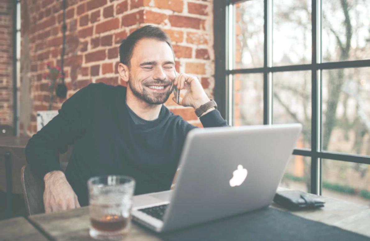 Journalist working in a busy newsroom environment